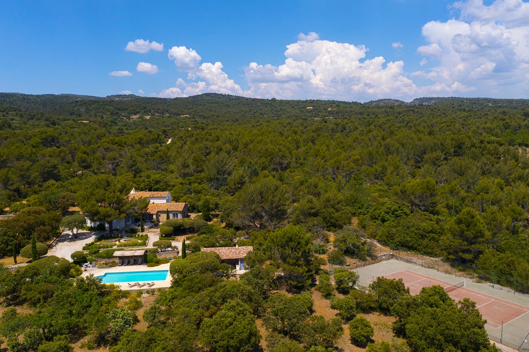 Property with a heated pool and tennis court in Gordes