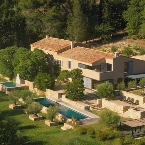 With a children's dormitory, 18m-long heated pool, boules court and 16 hectares of land, this beautiful property is located near the award-winning village of Roussillon, in the Luberon.